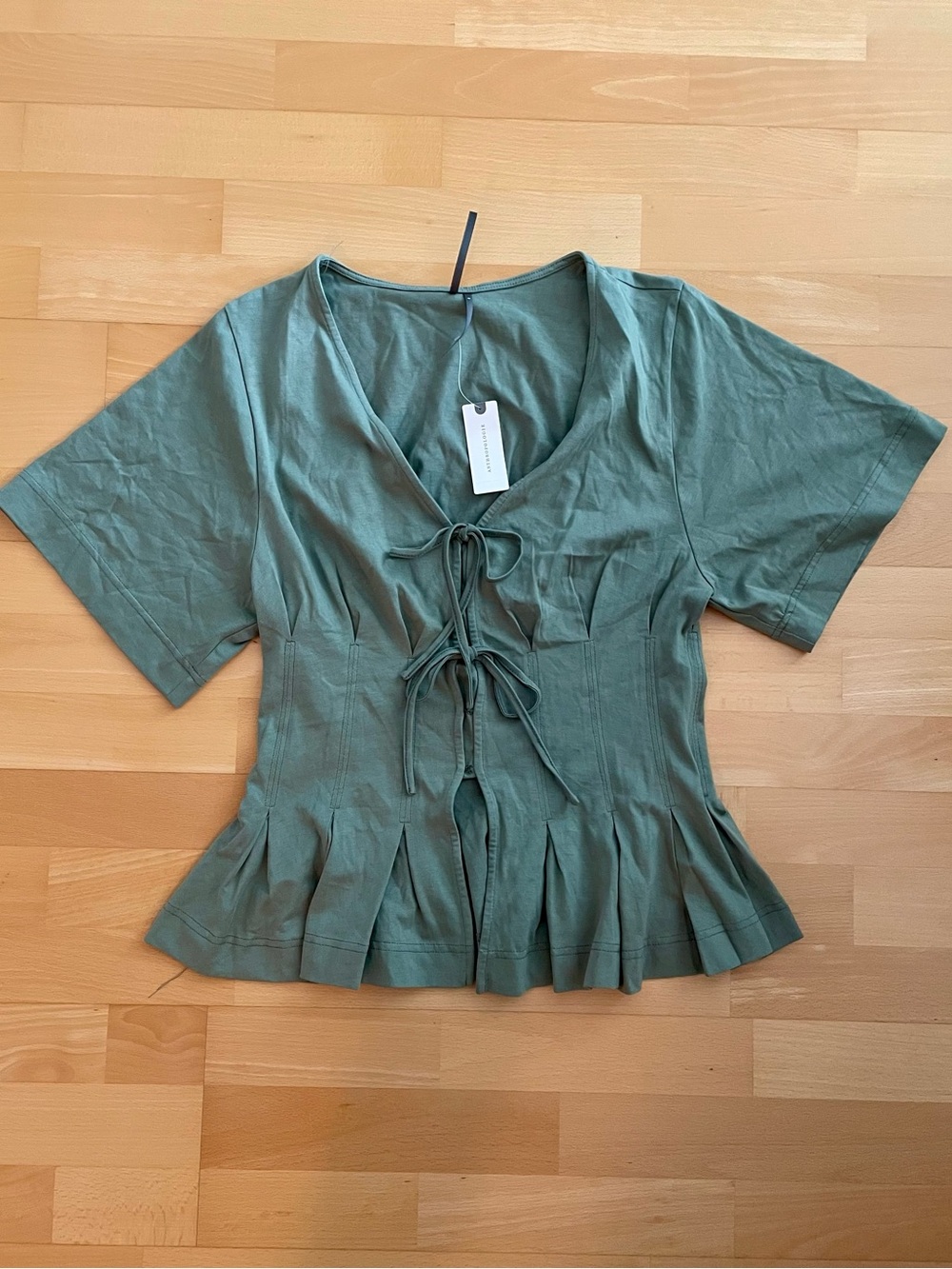 Anthropologie Tie-Front Peplum Top in Sage Green